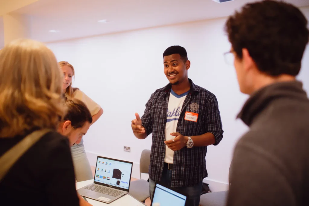 An entrepreneur pitching to an audience.